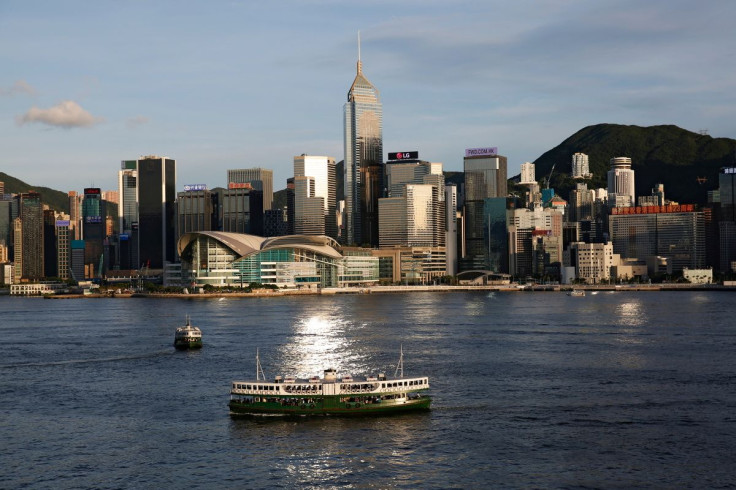 A Star Ferry boat crosses Victoria Harbour in front of a skyline of buildings in Hong Kong, China June 29, 2020.