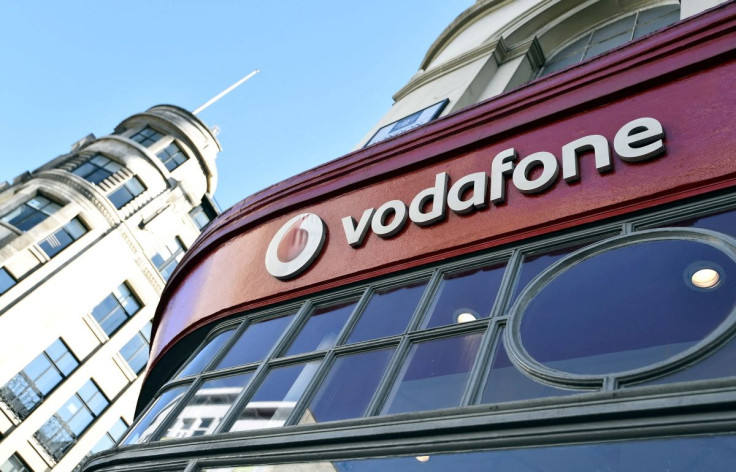 Branding for Vodafone is seen on the exterior of a shop in London, Britain, September 10, 2015.