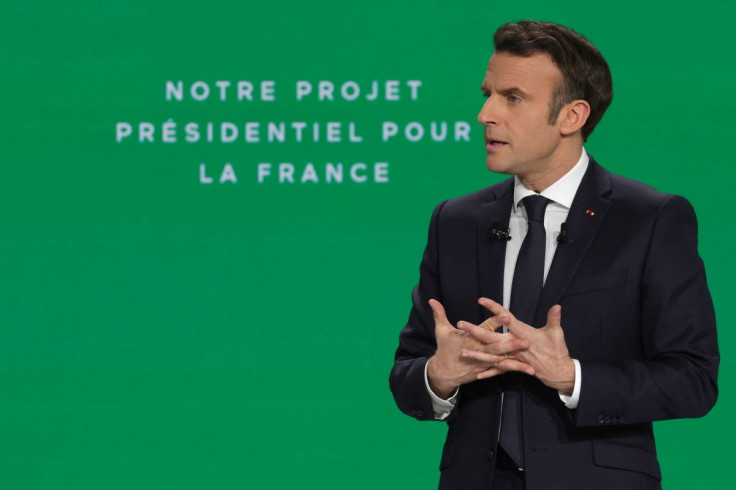 French President Emmanuel Macron, candidate for his re-election in the 2022 French presidential election, speaks during a news conference to unveil his presidential program at Les Docks de Paris, in Aubervilliers near Paris, France, March 17, 2022. 