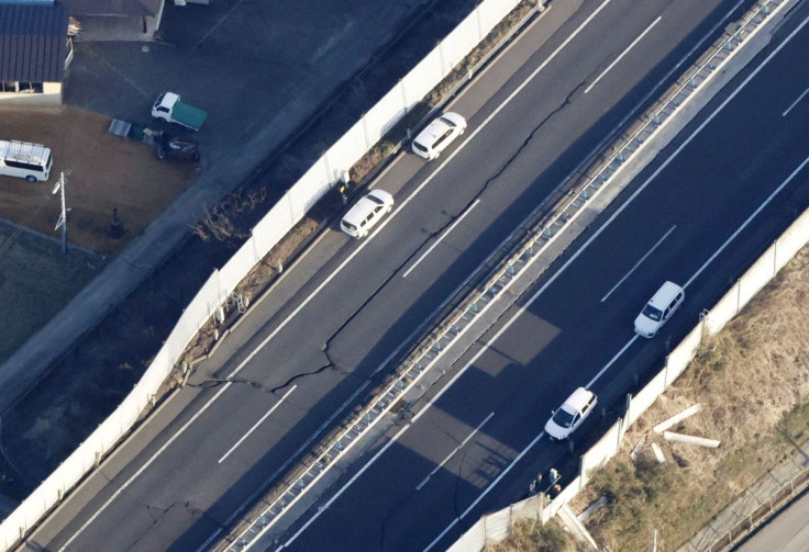Cracks on a road following a strong earthquake are pictured in Shiroishi, Miyagi prefecture, Japan in this photo taken by Kyodo on March 17, 2022. Mandatory credit Kyodo/via REUTERS