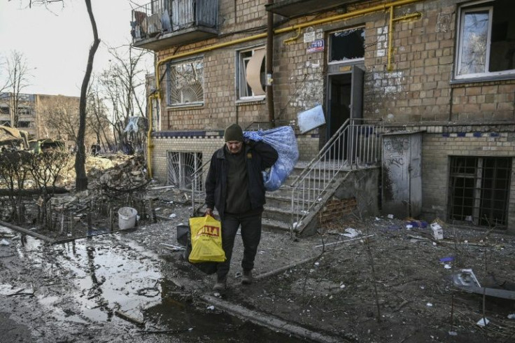 The blast ripped through a square between the school (far left), a kindergarten and several Soviet-era blocks of flats