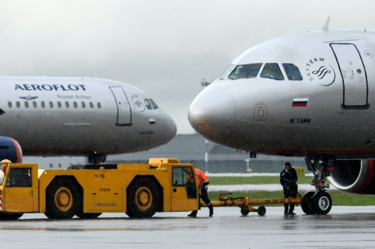 The United States has warned that anyone who provides services to American-made planes flown by carriers like Aeroflot that enter Russia without permission violates sanctions
