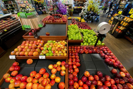 Apples are displayed for sale at the produce area as customers browse grocery store shelves inside Kroger Co.'s Ralphs supermarket amid fears of the global growth of coronavirus cases, in Los Angeles, California, U.S. March 15, 2020.  