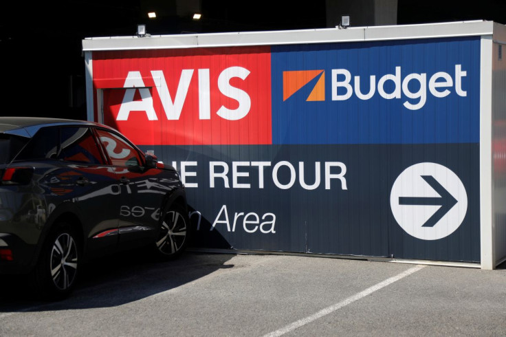 Logos of car rental companies Avis and Budget are seen outside Paris Charles de Gaulle airport in Roissy-en-France during the outbreak of the coronavirus disease (COVID-19) in France May 19, 2020.  