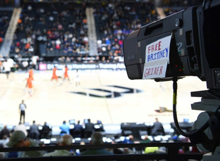 The message 'Free Brittney Griner' is taped to a camera during a basketball game at Henderson State University, in the US state of Nevada on March 12, 2022