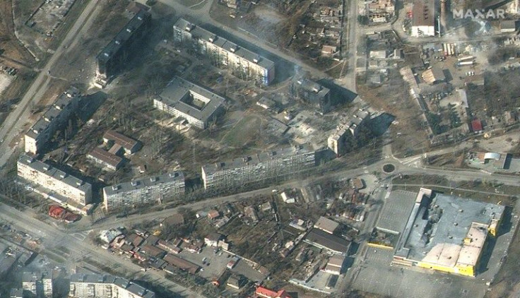 Heavily damaged apartment buildings and stores in Mariupol