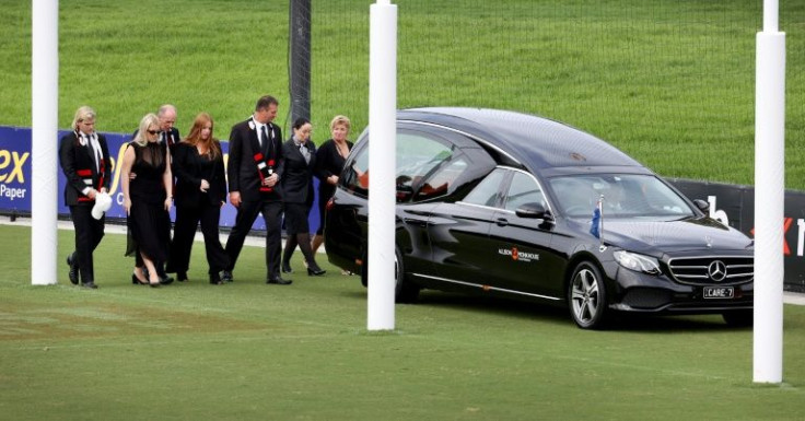 The family of Australian cricketer Shane Warne follows the hearse carrying his body