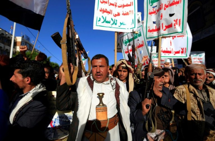 Huthi rebels supporters take to the streets of Sanaa on March 7, 2022 during a demonstration against the economic blockade imposed by the United States and Saudi Arabia on Yemen