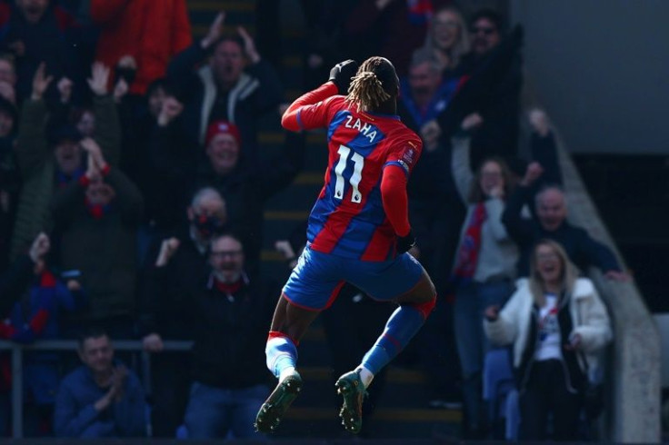 Wilfried Zaha jumps for joy as Crystal Palace reached the FA Cup semi-finals
