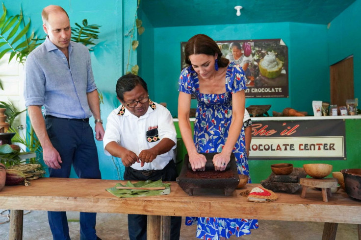 Britain's Prince William and Catherine, Duchess of Cambridge learn about cocoa grinding during a visit to Che'il Chocolate Farm at Stann Creek district in Belize amid their tour of the Caribbean, March 20, 2022. Paul Edwards/Pool via REUTERS