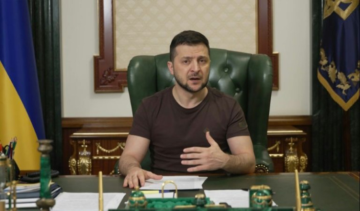 In this handout picture taken March 20, 2022 and released by the Ukrainian Presidency Press Office, Ukrainian President Volodymyr Zelensky delivers a video address in Kyiv