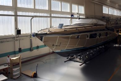 An employee works on a yacht at the Ferretti's shipyard in Sarnico, northern Italy, April 7, 2015. Picture taken on April 7, 2015. 