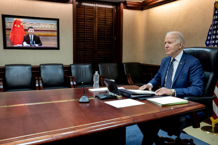 U.S. President Joe Biden holds virtual talks with Chinese President Xi Jinping from the Situation Room at the White House in Washington, U.S., March 18, 2022. The White House/Handout via REUTERS