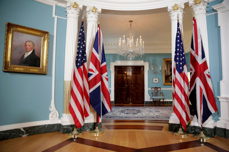The flags of the United States and the United Kingdom stand after bi-lateral photo between U.S. Secretary of State Rex Tillerson and British Foreign Minister Boris Johnson was cancelled at the State Department in Washington, U.S. March 22, 2017.      