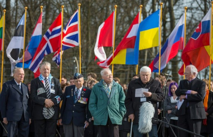 Boris Romantschenko, second right in this 2015 picture taken at a commemoration ceremony at the Buchenwald camp's memorial site in eastern Germany, has died in Russian bombing of Ukraine