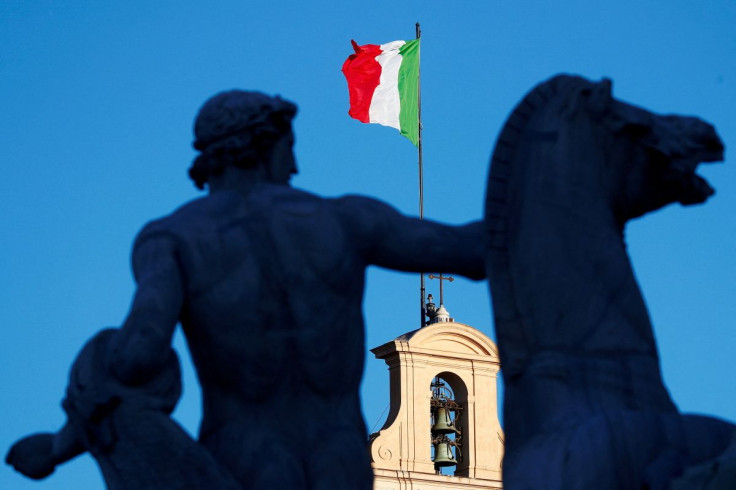 An Italian flag flies over the Quirinale Palace in Rome, Italy, January 26, 2021. 