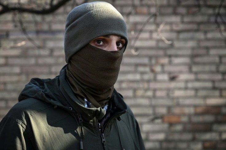 French volunteer fighter Pierre poses in a park in the Ukrainian capital Kyiv