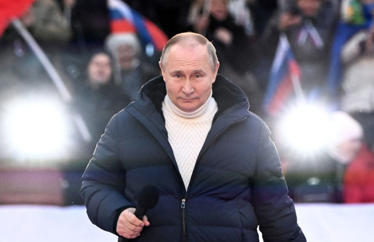 Russian President Vladimir Putin delivers a speech during a concert marking the eighth anniversary of Russia's annexation of Crimea at Luzhniki Stadium in Moscow, Russia March 18, 2022. Sputnik/Sergey Guneev/Kremlin via