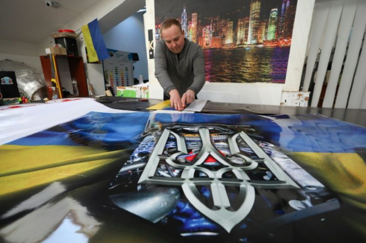The printing house is one of many outlets flooding Lviv with messaging urging Ukraine on to victory