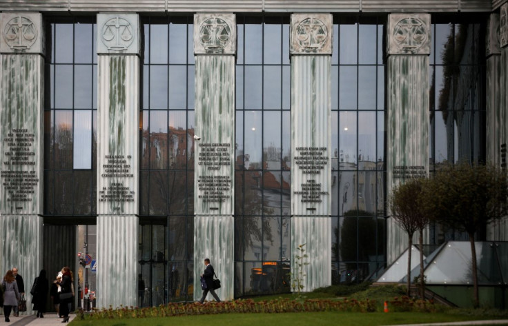 People walk outside the Supreme Court in Warsaw, Poland October 23, 2019.