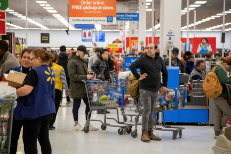 People shop at a Walmart Supercentre amid coronavirus fears spreading in Toronto, Ontario, Canada March 13, 2020.  