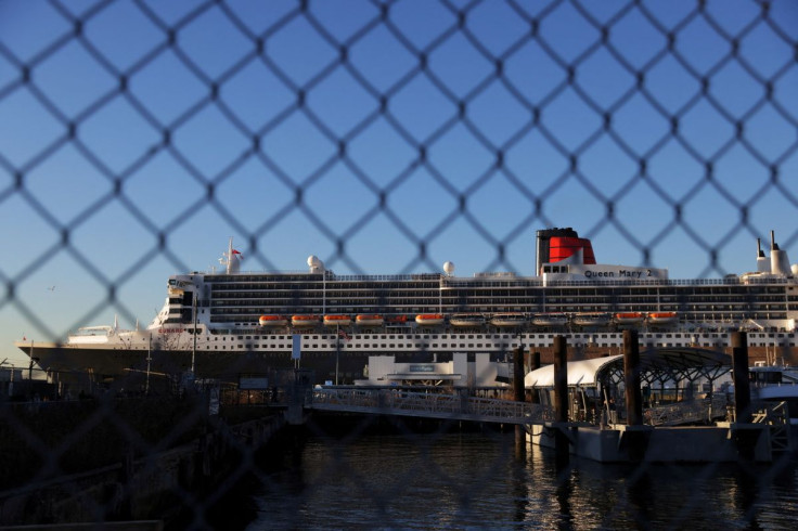 The Queen Mary 2 cruise ship by Cunard Line, owned by Carnival Corporation & plc. is seen docked at Brooklyn Cruise Terminal as the Omicron coronavirus variant continues to spread in Brooklyn, New York City, U.S., December 20, 2021. 
