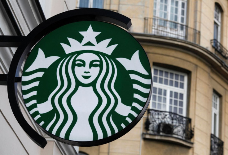 The Starbucks logo is seen outside the new Starbucks cafe in Warsaw March 6, 2011.