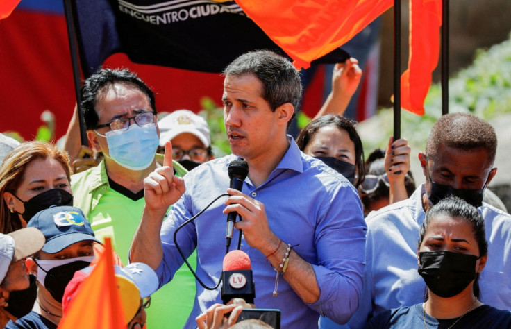 Venezuelan opposition leader Juan Guaido speaks to supporters as he takes part in an event called  "Save Venezuela", in Maiquetia, Venezuela February 19, 2022. 