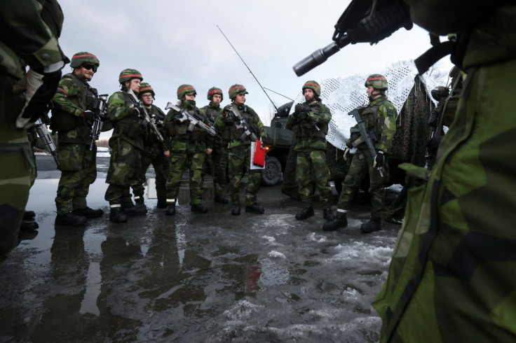 Swedish soldiers take part in a military exercise called "Cold Response 2022", gathering around 30,000 troops from NATO member countries plus Finland and Sweden, amid Russia's invasion of Ukraine, in Evenes, Norway, March 22, 2022.