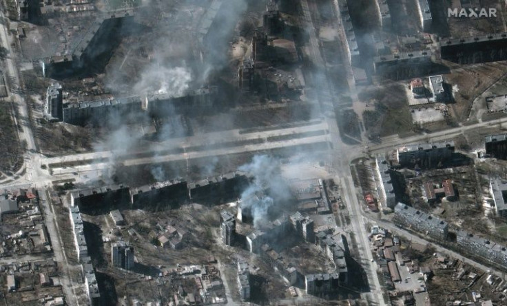 A Maxar satellite image taken on March 2 shows buildings on fire in the city of Mariupol, where nearly 100,000 people remain trapped