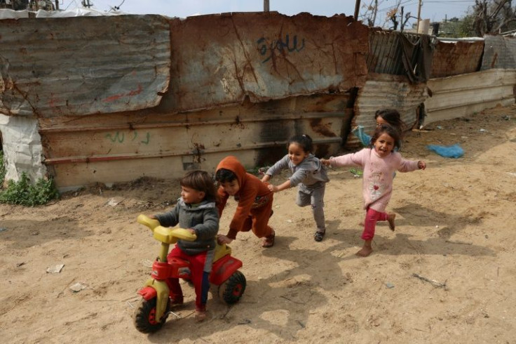 Palestinian children play in Beit Lahia in the northern Gaza Strip, on February 20, 2022