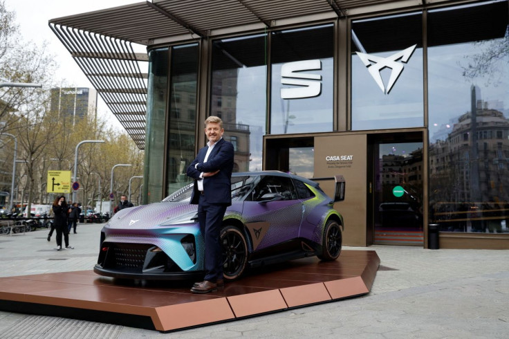Wayne Griffiths, chief executive officer (CEO) of the carmaker SEAT (Volkswagen Group), poses with concept car "Urban Rebel" in Barcelona, Spain, March 23, 2022.