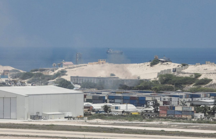 A general view shows smoke billowing from shipping containers near the Adan Abdulle International Airport international in Mogadishu, Somalia March 23, 2022.