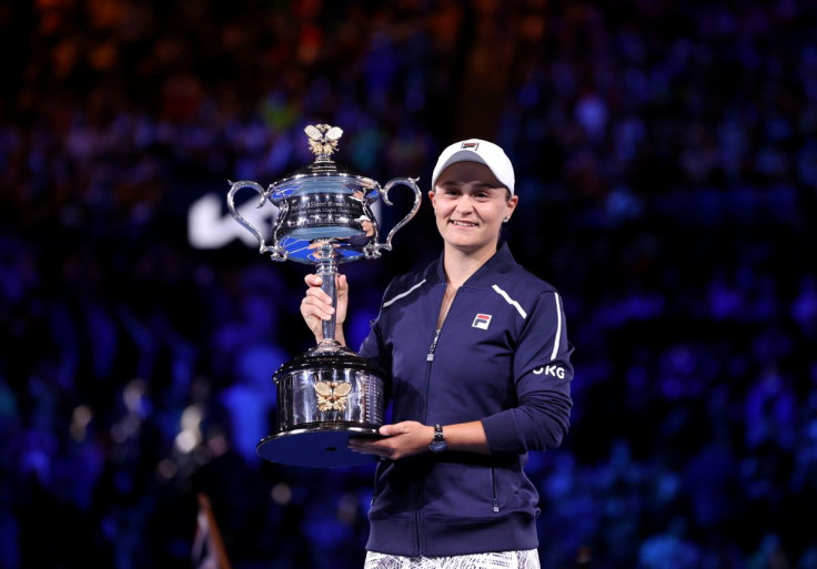 Tennis - Australian Open - Women's Singles Final - Melbourne Park, Melbourne, Australia - January 29, 2022 Australia's Ashleigh Barty poses as she celebrates winning the final against Danielle Collins of the U.S. with the trophy 