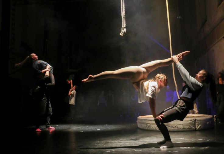 Ukrainian students from the Kyiv Municipal Academy of Performing and Circus Arts and members of Czech Cirk La Putyka contemporary circus company rehearse before a joint performance in Prague, Czech Republic, March 21, 2022. Picture taken March 21, 2022. P
