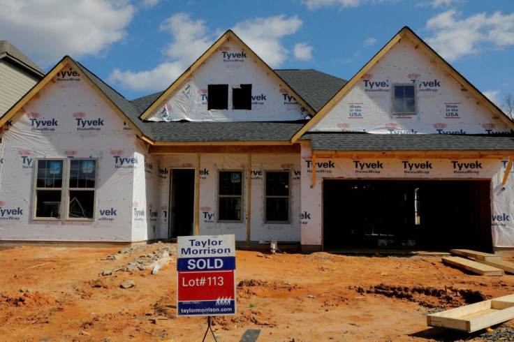 A home under construction stands behind a "sold" sign in a new development in York County, South Carolina, U.S., February 29, 2020. 