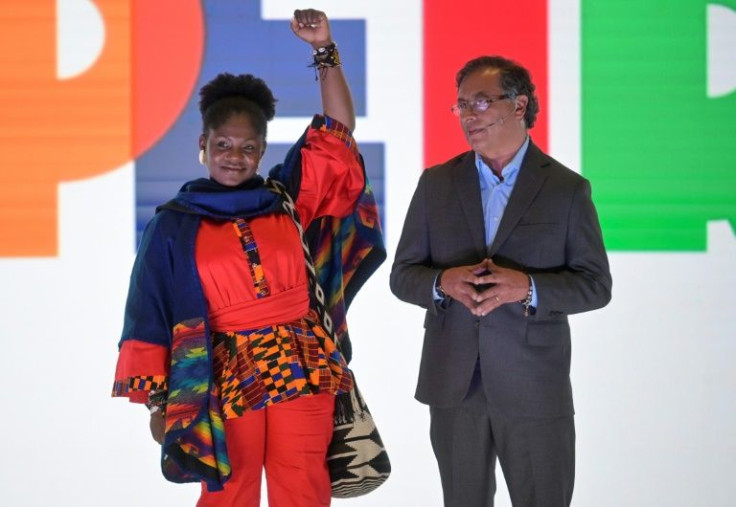 Francia Marquez (left) will accompany poll leader and former guerrilla Gustavo Petro in May's presidential election