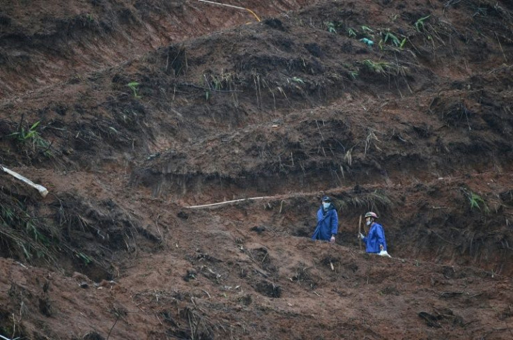 The velocity of the crash -- which cut deep wounds into the muddy ground and scattered plane parts and passenger belongings across a vast area -- has shredded hopes of finding survivors