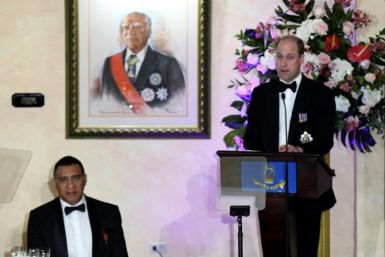 Britain's Prince William (R) expressed 'sorrow' for his country's role in the slave trade at a state dinner in Jamaica on Wednesday evening