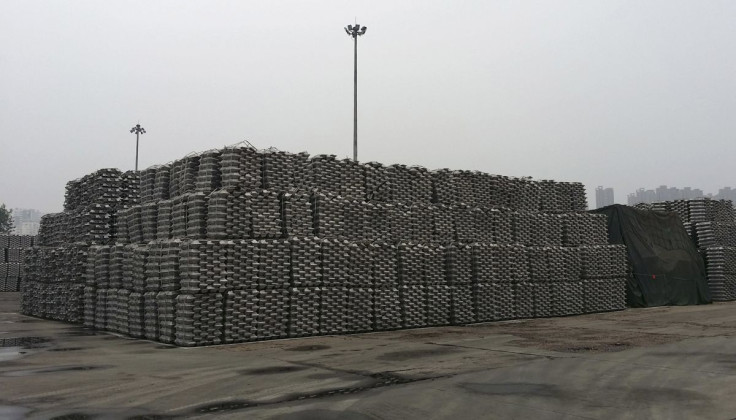 Aluminum ingots are piled up at a bonded storage area at the Dagang Terminal of Qingdao Port, in Qingdao, Shandong province June 7, 2014.