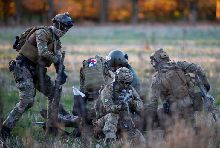 Belgian army Special Forces are seen during the Black Blade military exercise involving several European Union countries and organised by the European Defence Agency at Florennes airbase, Belgium November 30, 2016.