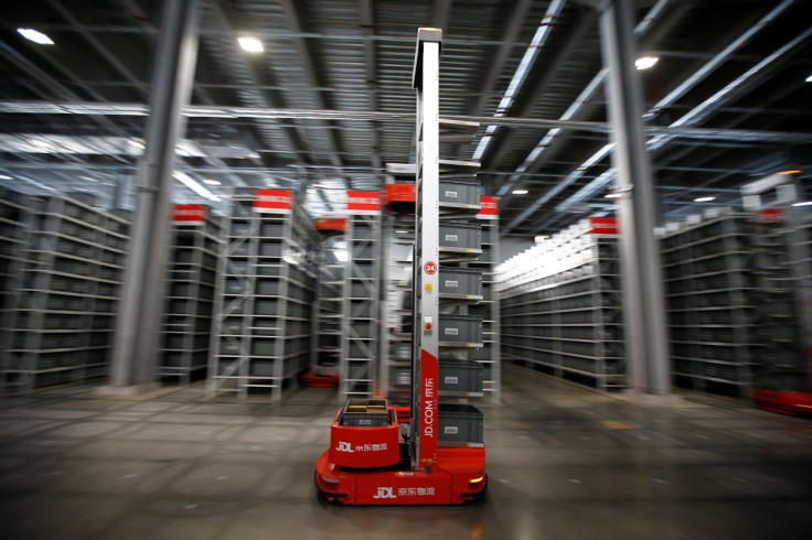 An automated ground robot transports containers at the Asia No.1 logistics centre of JD Logistics, by JD.com, amid the Singles' Day shopping festival, during an organised tour in Beijing, China, November 9, 2021. 