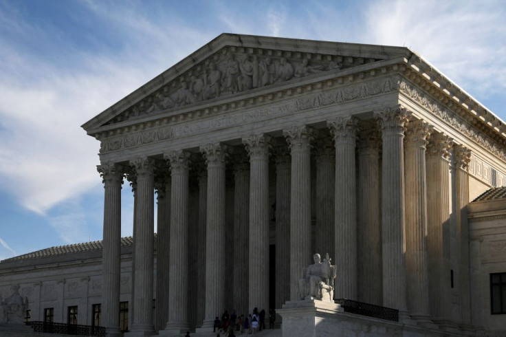 People visit the U.S. Supreme Court building in Washington, U.S. March 15, 2022. 