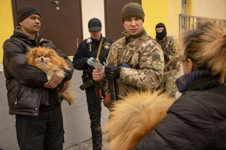 Yaroslava Delishevska, 58, left with her family's five dogs