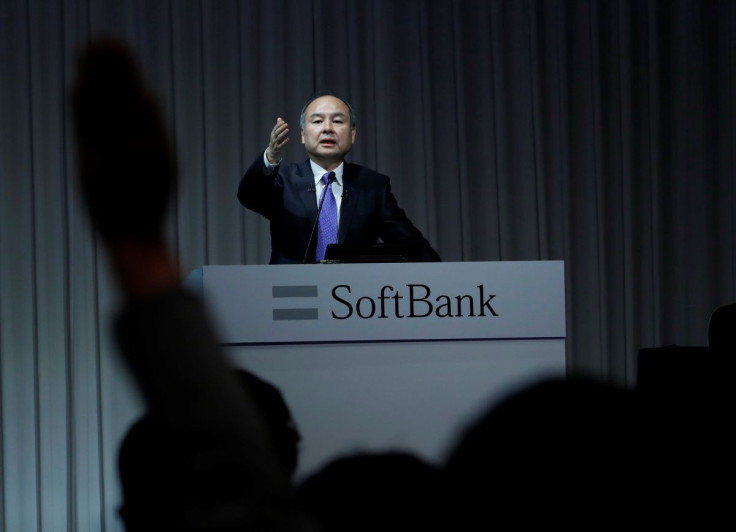 A journalist raises her hand to ask a question to Japan's SoftBank Group Corp Chief Executive Masayoshi Son during a news conference in Tokyo, Japan, November 5, 2018.  