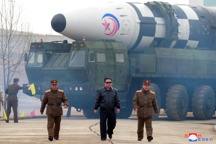 North Korean leader Kim Jong Un walks away from what state media report is a "new type" of intercontinental ballistic missile (ICBM) in this undated photo released on March 24, 2022 by North Korea's Korean Central News Agency (KCNA). KCNA via REUTERS  