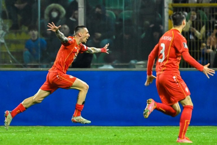 Night to remember: North Macedonia's Aleksandar Trajkovski (left) celebrates after scoring