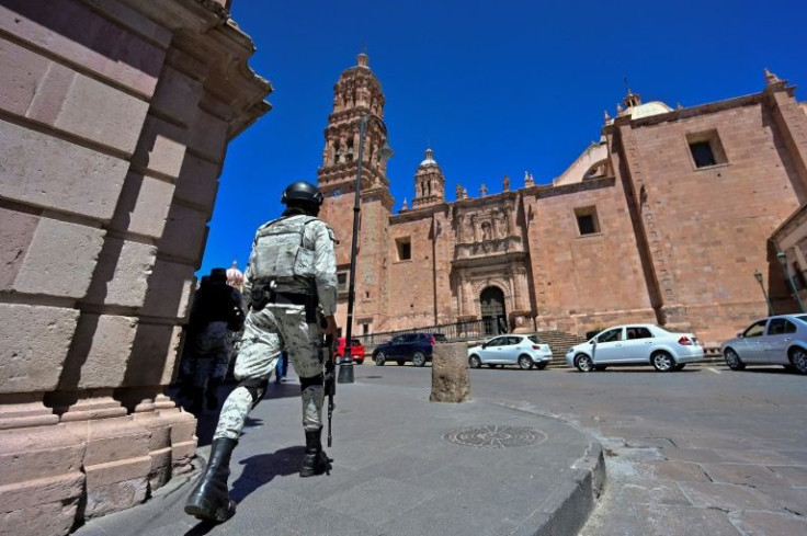 A member of the National Guard patrols the capital of Mexico's violence-plagued Zacatecas state