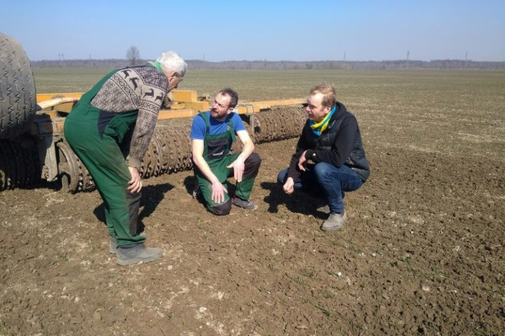 German farmers Tim Nandelstädt (centre) and Torben Reelfs (right) push ahead with their crop planting in Ukraine despite Russia's invasion