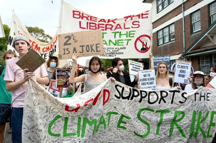 Schoolchildren shout slogans outside the Australian prime minister's residence as part of a "global climate strike"